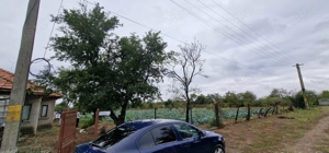 Casa de vânzare cu teren . - imagine 2