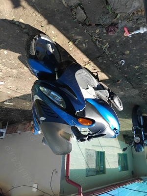 Vand schimb scuter malaguti medison 125cc accept unele variante, cu auto cu acte valabile  - imagine 2