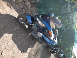 Vand schimb scuter malaguti medison 125cc accept unele variante, cu auto cu acte valabile