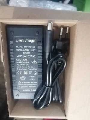 Incarcator trotineta bicicleta electrica 99 ron NOU  42v 2A model XIAOMI - imagine 2