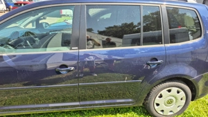 Vand volkswagen touran super economic - imagine 2