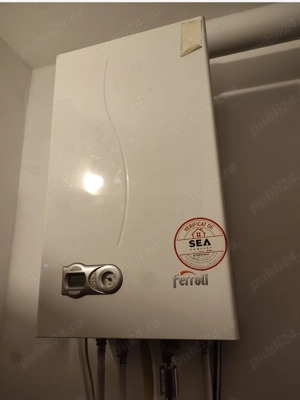 Vând centrala termica Ferroli 24