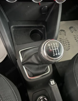 Dacia Duster 1.6 SCe 4WD Comfort - imagine 17