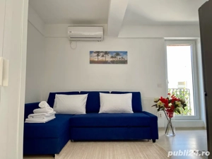 Canapea extensibila albastra IKEA