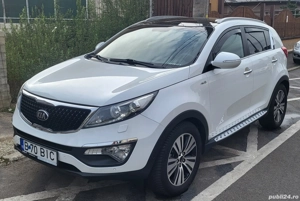 Kia Sportage ,4X4 ,automată ,trapă panormaic, alb perlat.