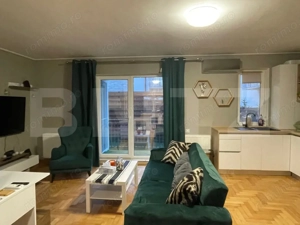 Apartament semidecomandat cu 3 camere, gradina de 80 mp, parcare, zona Terra