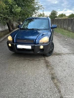 Vand Hyundai tucson 4x4 la buton  - imagine 4