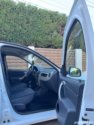 Dacia Logan 1.4 MPI doar 13.900KM unic proprietar Achizionata Meridian Sud Bucuresti  - imagine 9 Dacia Logan 1.4 MPI doar 13.900KM unic proprietar Achizionata Meridian Sud Bucuresti  - imagine 9