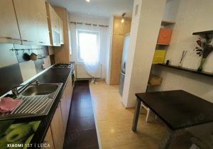 Apartament decomandat, mobilat, utilat, cu doua camera si loc de parcare in Racadau - imagine 5