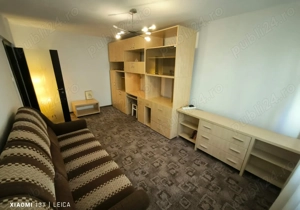 Apartament decomandat, mobilat, utilat, cu doua camera si loc de parcare in Racadau - imagine 2