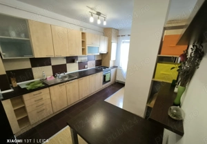 Apartament decomandat, mobilat, utilat, cu doua camera si loc de parcare in Racadau - imagine 6