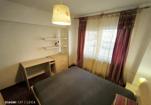 Apartament decomandat, mobilat, utilat, cu doua camera si loc de parcare in Racadau - imagine 4