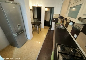 Apartament decomandat, mobilat, utilat, cu doua camera si loc de parcare in Racadau - imagine 7