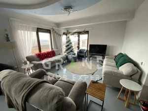 Casă elegantă de închiriat în Borhanci cu parcare si curte - liniste si confort