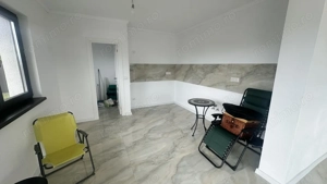 Casa pe un singur nivel 4 camere , in zona Harman  - imagine 4