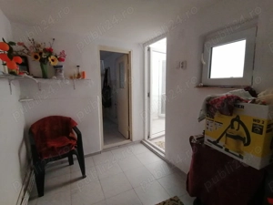 Centru apartament în imobil P+2 cu o curte interioara proprie