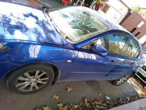 Vand Mazda 3 usor avariata - imagine 2 Vand Mazda 3 usor avariata - imagine 2