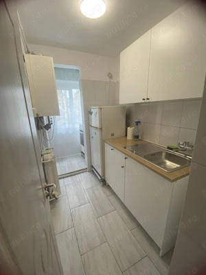 Închiriez apartament 2 camere cu centrală proprie sector 4