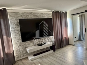 Casa individuala P+1+M,teren 900mp,zona Modern