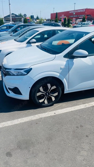 Dacia Logan în garanție  - imagine 2