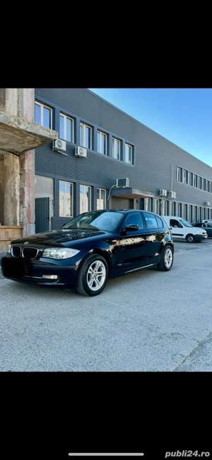 BMW 116 din 2009 - imagine 4