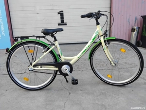 Vând bicicleta din aluminiu pentru damă 