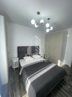 Apartament cu 2 camere,loc de parcare,centrala proprie, zona Torontal - imagine 11