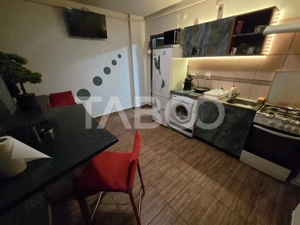 Garsoniera decomandata 28 mp utili mobilata utilata zona Tilisca Sibiu - imagine 4