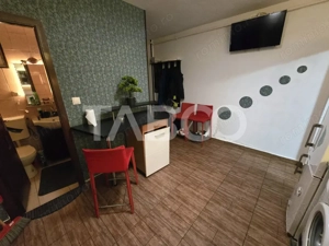 Garsoniera decomandata 28 mp utili mobilata utilata zona Tilisca Sibiu - imagine 9