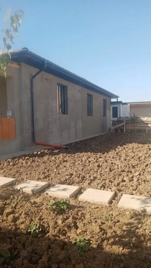 Casă pe un nivel cu garaj, terasă și beci, Com. Berceni, teren 406 mp - imagine 7