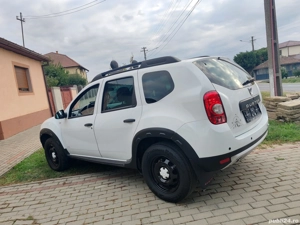 Dacia Duster 4*4-An 2013-Diesel 110 Cai-139.000 Km-Ediție Adventure! - imagine 5 Dacia Duster 4*4-An 2013-Diesel 110 Cai-139.000 Km-Ediție Adventure! - imagine 5