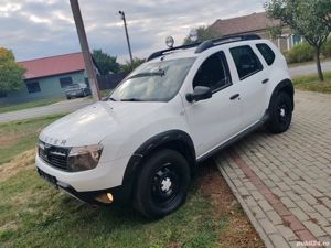 Dacia Duster 4*4-An 2013-Diesel 110 Cai-139.000 Km-Ediție Adventure! - imagine 4 Dacia Duster 4*4-An 2013-Diesel 110 Cai-139.000 Km-Ediție Adventure! - imagine 4