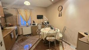 Apartament cu 3 camere si 2 balcoane, etaj intermediar, zona Bucovina
