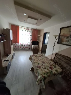 Închiriez apartament cu 2 camere bloc 4 etaje ,etaj intermediar