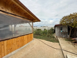 Casa pe parter Clinceni , str Ortansei , teren 640 mp. - imagine 8