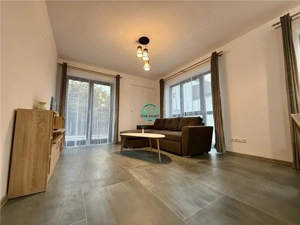 Apartament cu 3 camere, bloc nou, parcare subterana, str. Revolutiei. - imagine 3 Apartament cu 3 camere, bloc nou, parcare subterana, str. Revolutiei. - imagine 3