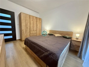 Apartament cu 3 camere, bloc nou, parcare subterana, str. Revolutiei. - imagine 10 Apartament cu 3 camere, bloc nou, parcare subterana, str. Revolutiei. - imagine 10