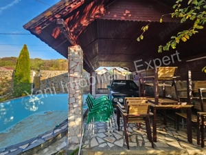 Casă + spațiu comercial de vânzare în comuna Băiculești, sat Tutana, județ Argeș. - imagine 16