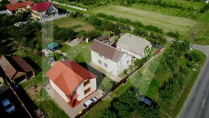 Casă spațioasă în Frumușeni, cu teren generos de 1200 mp - imagine 5