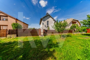 Casă spațioasă în Frumușeni, cu teren generos de 1200 mp - imagine 9