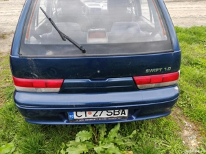 Suzuki Swift 1.0 an 2003 stare buna 499e. - imagine 2