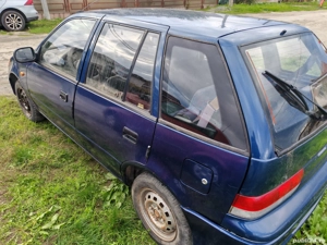 Suzuki Swift 1.0 an 2003 stare buna 499e. - imagine 4