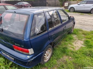 Suzuki Swift 1.0 an 2003 stare buna 499e. - imagine 3