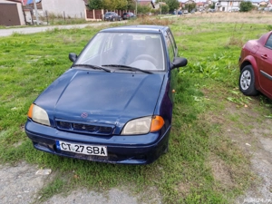 Suzuki Swift 1.0 an 2003 stare buna 650 e.