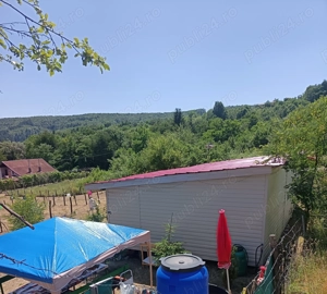 Vind teren intravilan și cabană 