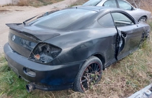 Dezmembrez HYUNDAI COUPE 2 (GK) 1.6i (02.2004) + 2.0i (03.2002) - imagine 8