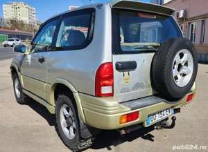 Suzuki Grand Vitara 1.6 benzina 4x4 - imagine 5 Suzuki Grand Vitara 1.6 benzina 4x4 - imagine 5