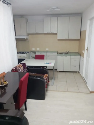 Închiriez apartament cu doua camere  la curte....