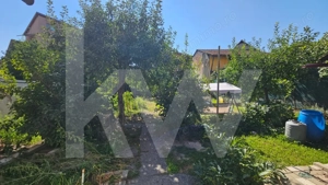 Casă individuală compusă din două apartamente, cu teren liber de 540 mp  - imagine 20