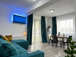 BV GLAM APARTMENTS Cazare Apartamente 1-2-3 cam Regim Hotelier Coresi - imagine 2